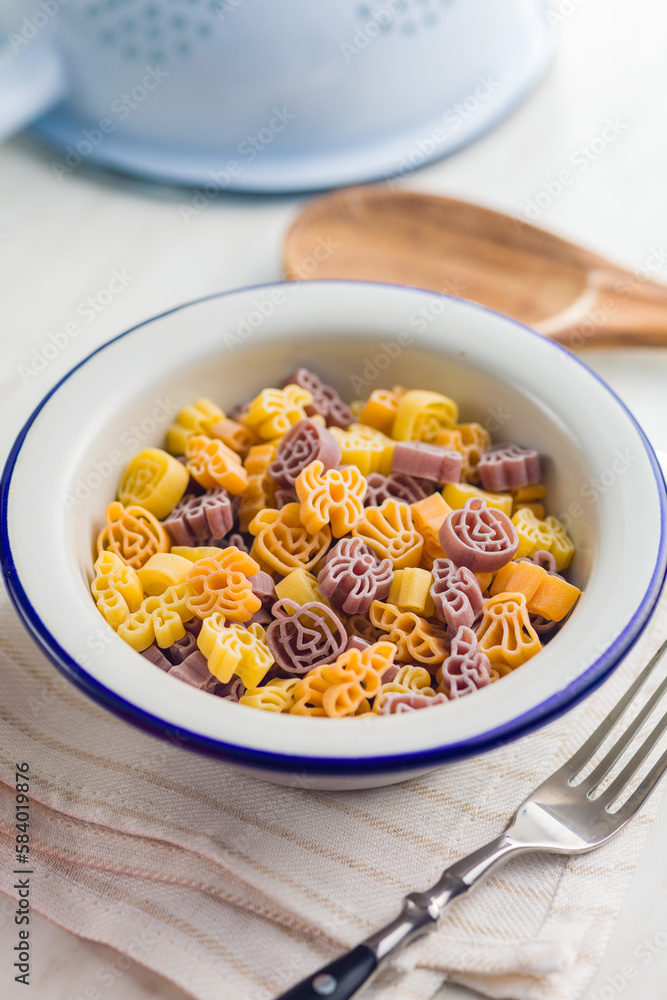Pasta of various scary shapes. Uncooked halloween pasta in bowl. Pasta of various scary shapes. Uncooked halloween pasta in bowl.