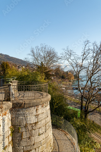 Pretty view over the lake of Thun in Hilterfingen in Switzerland photo