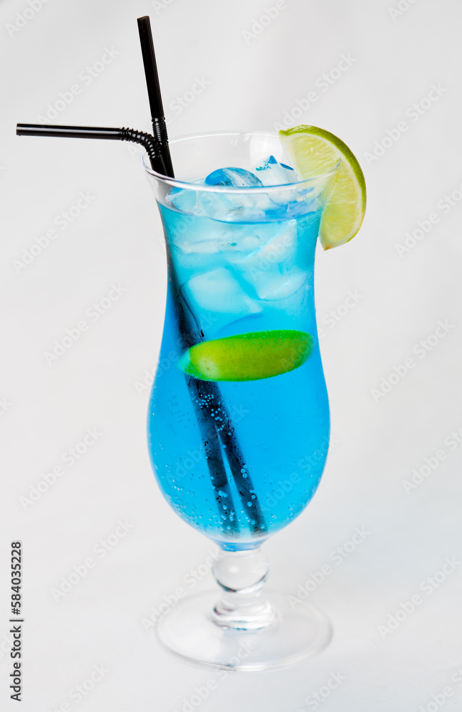 blue cocktail with lime isolated on white background blue cocktail with lime isolated on white background
