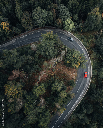 car driving around a sharp turn, top view
