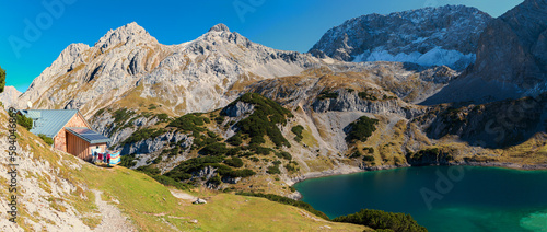 Fototapeta Naklejka Na Ścianę i Meble -  idyllic alpine lake Drachensee and mountain hut, Mieminger Alps austria