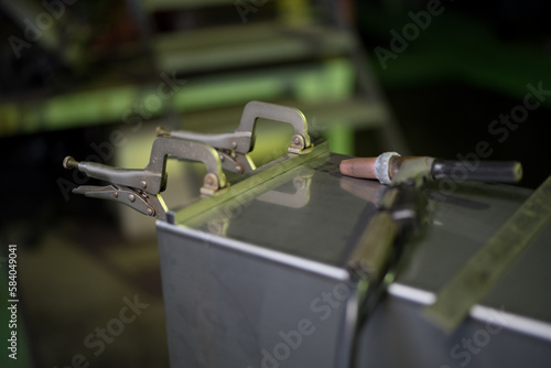 Work scene welding parts to each other