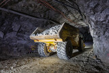 Dump truck filled with ore underground at a mine in Australia