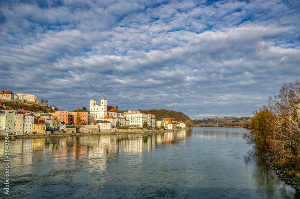 High dynamic range cityscape view of Passau city with view at the river inn in late afternoon sunlight in march