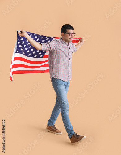 Young man in eyeglasses wav...