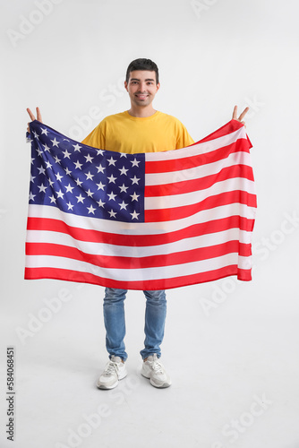 Young man with USA flag on ...