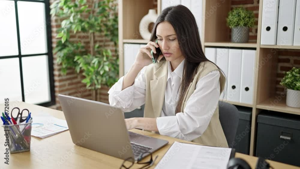 Young beautiful hispanic woman business worker working at office Young beautiful hispanic woman business worker working at office