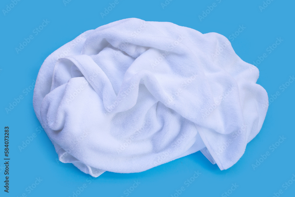 Used towel on blue background. Used towel on blue background.