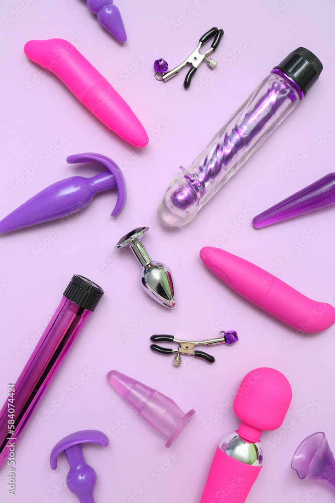 Different sex toys on lilac background Different sex toys on lilac background