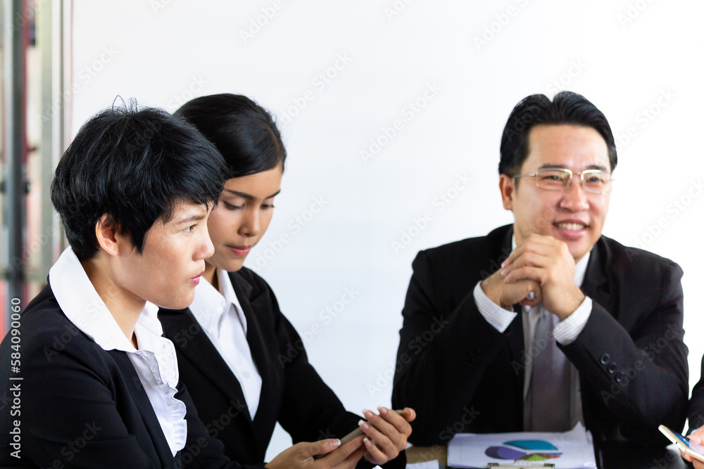 Portrait of young business people having meeting in the modern office, having fun together and setup business target or marketing result. Portrait of young business people having meeting in the modern office, having fun together and setup business target or marketing result.