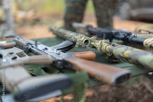 Gun weapons bags and bullets for Army marine corps soldier military war participating and preparing to attack the enemy in Thailand during Exercise Cobra Gold in battle. Combat force training.