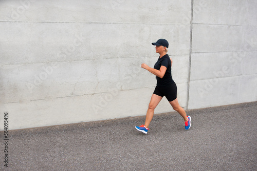 Attractive mature blond woman out for her morning run.