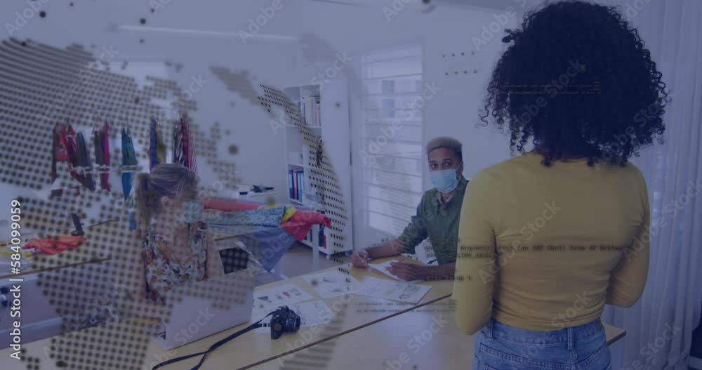 Animation of globe, data processing over diverse business people in face masks Animation of globe, data processing over diverse business people in face masks