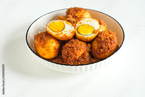 telur balado or spicy egg is traditional popular food made from boiled egg with tomato and paste chili or sambel