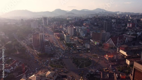 Cinematic aerial of downtown Yaounde, traffic at Poste Centrale roundabout photo