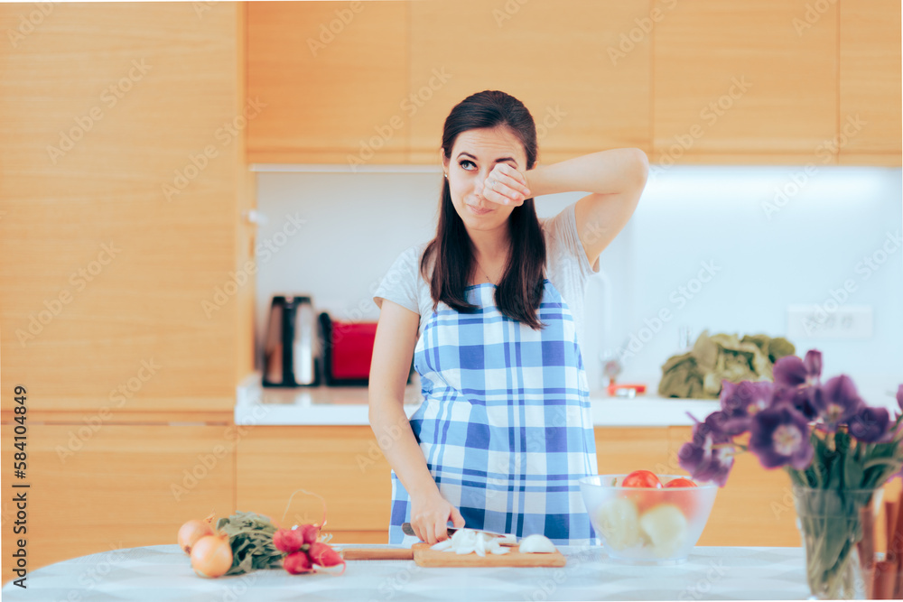 Woman Crying While Chopping Onion at Home. Housewife rubbing her watery tearful eyes cutting spicy ingredients
Woman Crying While Chopping Onion at Home. Housewife rubbing her watery tearful eyes cutting spicy ingredients