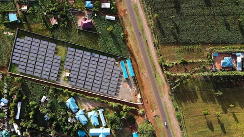 Wallpaper Mural generation sky concept science environment farm panel blue. Drone flying ove the solar panels plant in the rural africa. Torontodigital.ca