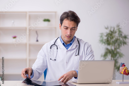 Young male doctor radiologist working at the hospital