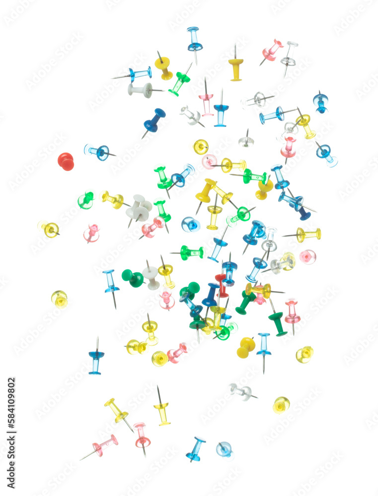 Push Pins in various color fly floating in mid air. Many group colour pins fall as office school stationary. Abstract pushpin explode unbox. White background isolated high speed shutter freeze motion