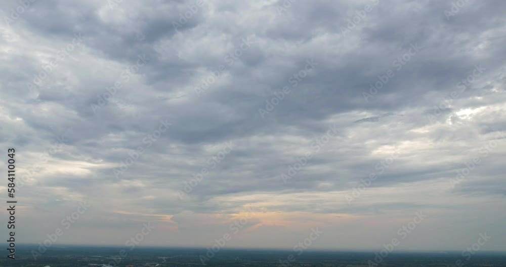 Beautiful movement of fluffy clouds with clear blue sky. The camera follows the clouds floating, Aerial view of Sky with countryside rural fields and villages, 4k Timelapse, Nature background. Beautiful movement of fluffy clouds with clear blue sky. The camera follows the clouds floating, Aerial view of Sky with countryside rural fields and villages, 4k Timelapse, Nature background.