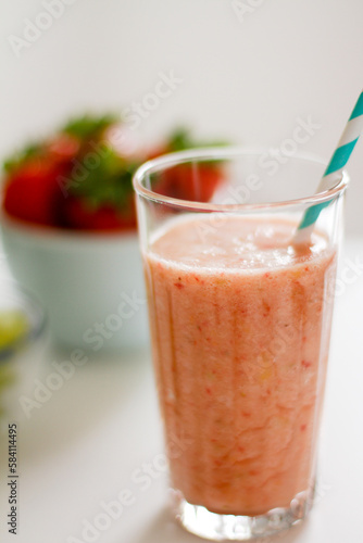 homemade strawberry smoothie in a glass
