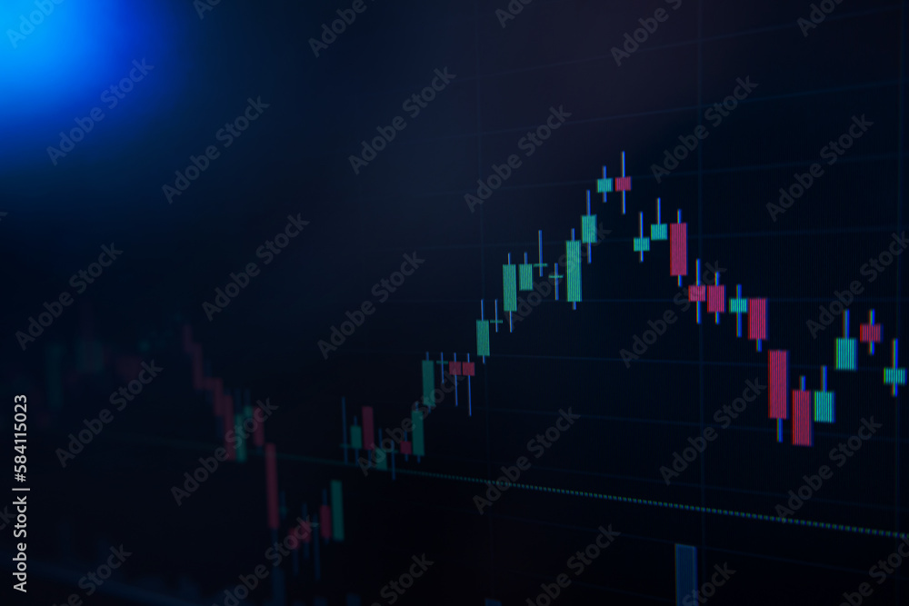Screen of laptop of stock market candlestick chart on blue background. Stock market trends concept. Screen of laptop of stock market candlestick chart on blue background. Stock market trends concept.