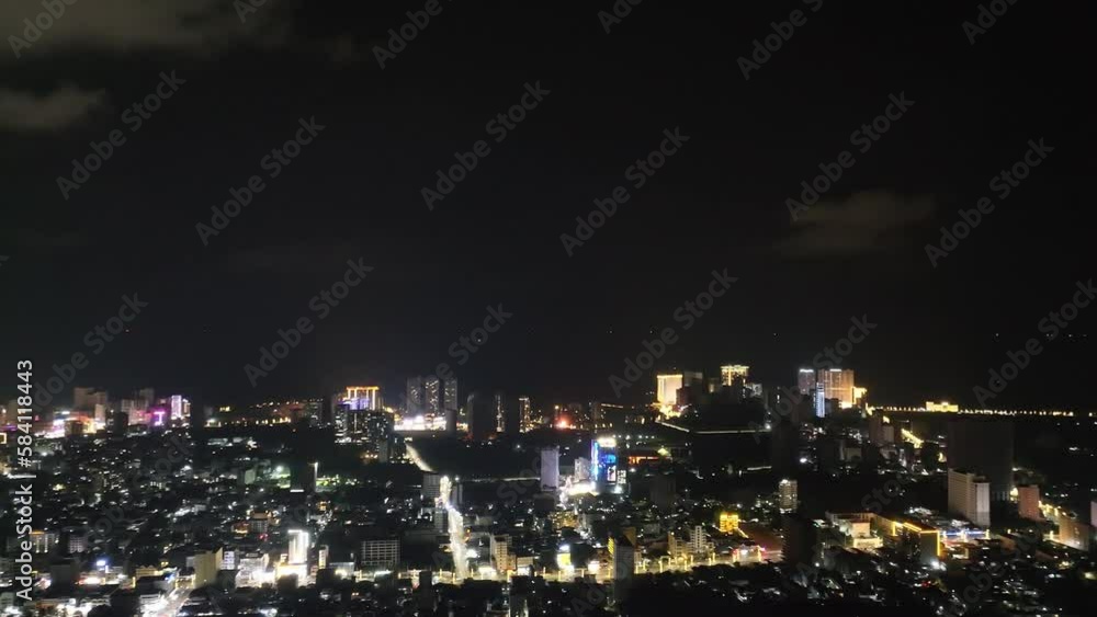 Night sky over the city of Sihanoukville, Cambodia, illuminated by beautiful lights taken by a drone Night sky over the city of Sihanoukville, Cambodia, illuminated by beautiful lights taken by a drone