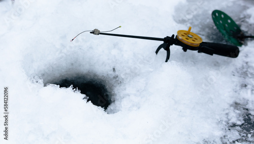Fototapeta Naklejka Na Ścianę i Meble -  Fishing rod for winter ice fishing. Close-up.