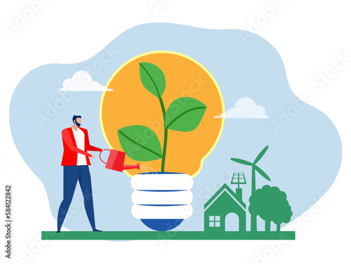 businessman watering a small plant with a light bulb on it creating a concept Green eco home with save energy and recycle; Ecology and environment conservation concept