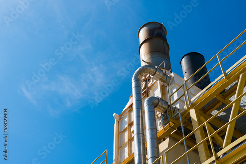 oil refinery tower on offshore platform.