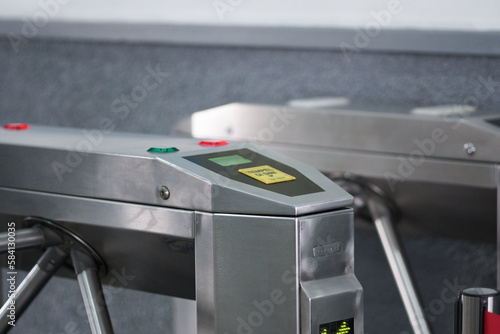 The tripod turnstile with electronic card reader is closed photo