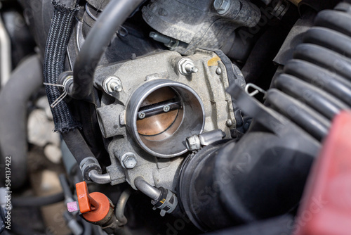 Canvastavla Cleaning car engine throttle body closeup with selective focus