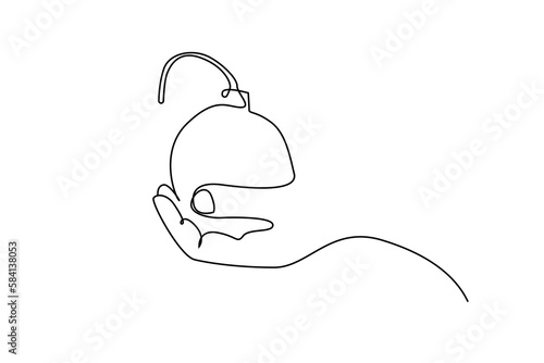 one human hand is holding a bomb danger
