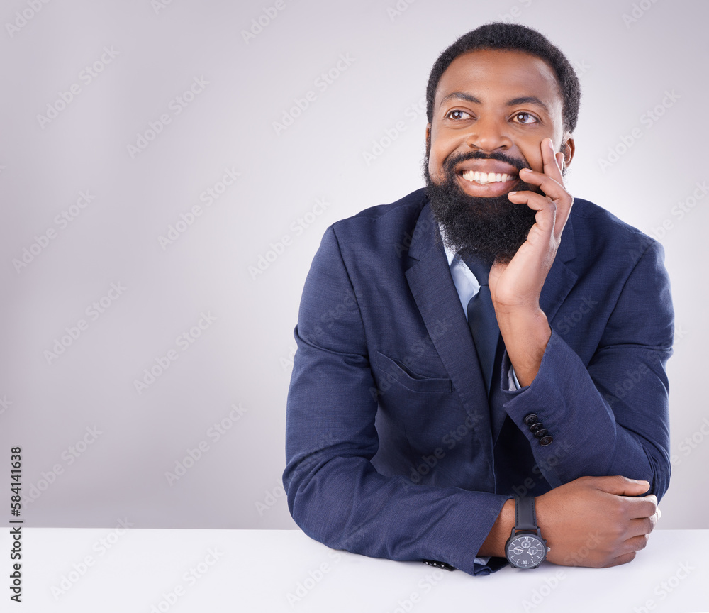 Happy, thinking and a black man sitting by a table isolated on a white background in a studio. Smile, thoughtful and an African businessman with an idea, thought or contemplation on a backdrop Happy, thinking and a black man sitting by a table isolated on a white background in a studio. Smile, thoughtful and an African businessman with an idea, thought or contemplation on a backdrop