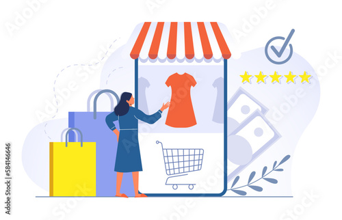 Girl do shopping online, choose clothes on web shop. Woman using mobile application to buy dress. Clothing store photo