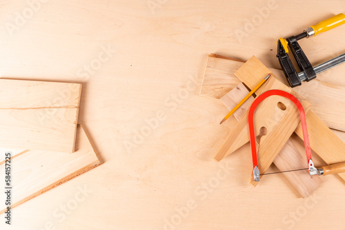 Carpentry Profession Ideas. Variety of Separate Lineup of Assorted Working Tools on Wood Material.