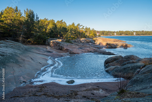 View of the rocky shore of Puistovuori in winter, Hanko, Finland