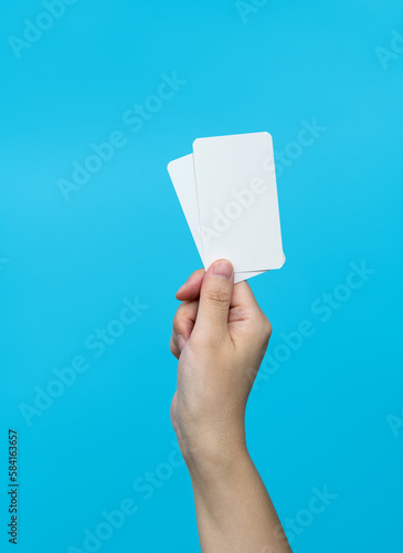 People hand holding a business cards