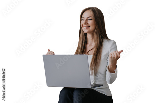 Successful young female entrepreneur talks via internet clenched fists like a winner, smiling makes video call against transparent background, sits on couch, using laptop. Business, remote education.