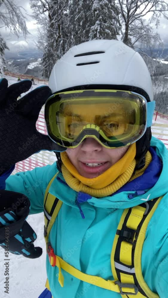 happy woman taking selfie on slope happy woman taking selfie on slope