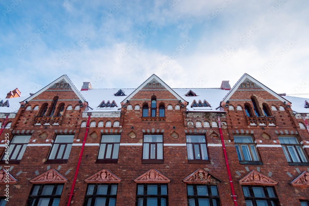Facade view of red brick Bank of Finland building at Market Square, Vyborg, Russia. High quality photo Facade view of red brick Bank of Finland building at Market Square, Vyborg, Russia. High quality photo