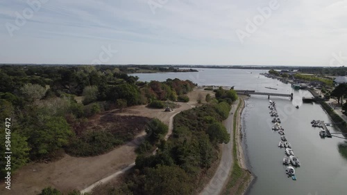 La Marle inlet nautical transit canal across Vannes Northern France with boats, Aerial flyover shot photo