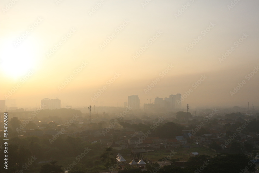 The view of the sunrise in the middle of the city seen from above, The view of the sunrise in the middle of the city seen from above,