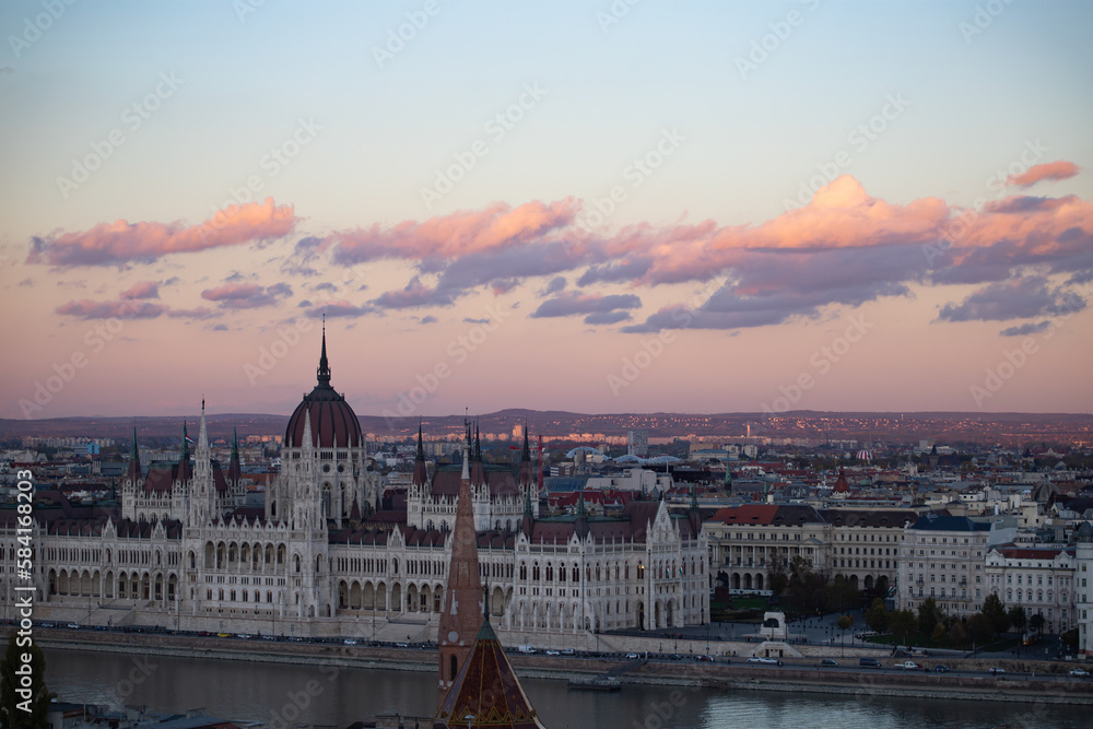 Fototapeta premium Budapest parliament in magic sunset, and the Danube river, Hungary
