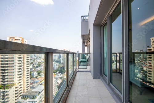 Balcony overlooking the city on a high-rise apartment.