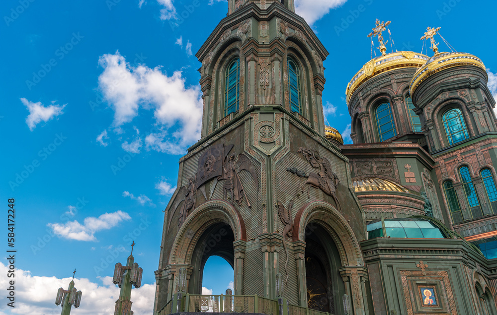 Obraz premium Moscow region, Russia. Bell tower with the icon of Jesus Christ above the entrance to The Main Cathedral of the Russian Armed Forces (Cathedral of the Resurrection of Christ).