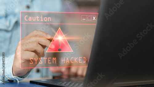 System hacked alert after cyber attack on computer network. compromised information concept. internet virus cyber security and cybercrime. hackers to steal the information is a cybercriminal..