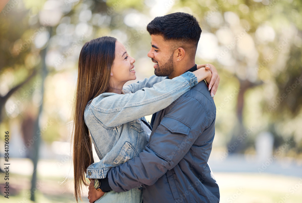 Couple, hug and outdoor with a smile for love, care and happiness together in summer. Young man and woman at nature park for affection or trust on a happy and romantic date or vacation to relax Couple, hug and outdoor with a smile for love, care and happiness together in summer. Young man and woman at nature park for affection or trust on a happy and romantic date or vacation to relax