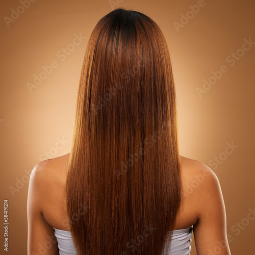Back of hair, beauty and woman in studio for shampoo, wellness and keratin treatment on brown background. Hairdresser mockup, salon and girl with hairstyle for growth, haircare texture and cosmetics