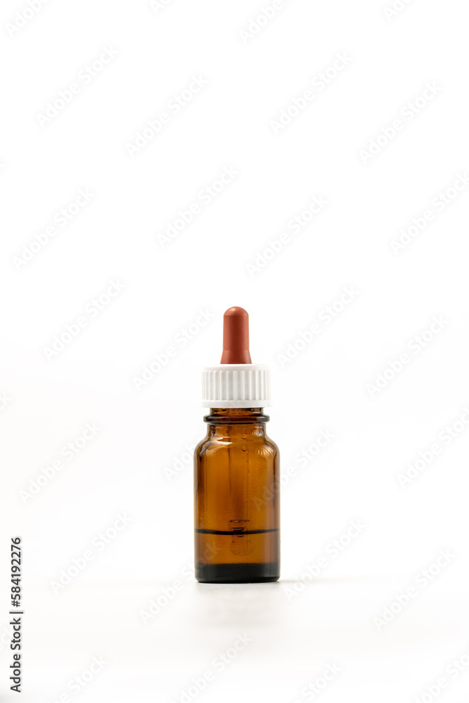 Medical drops in a vial isolated on white background with clipping path Medical drops in a vial isolated on white background with clipping path